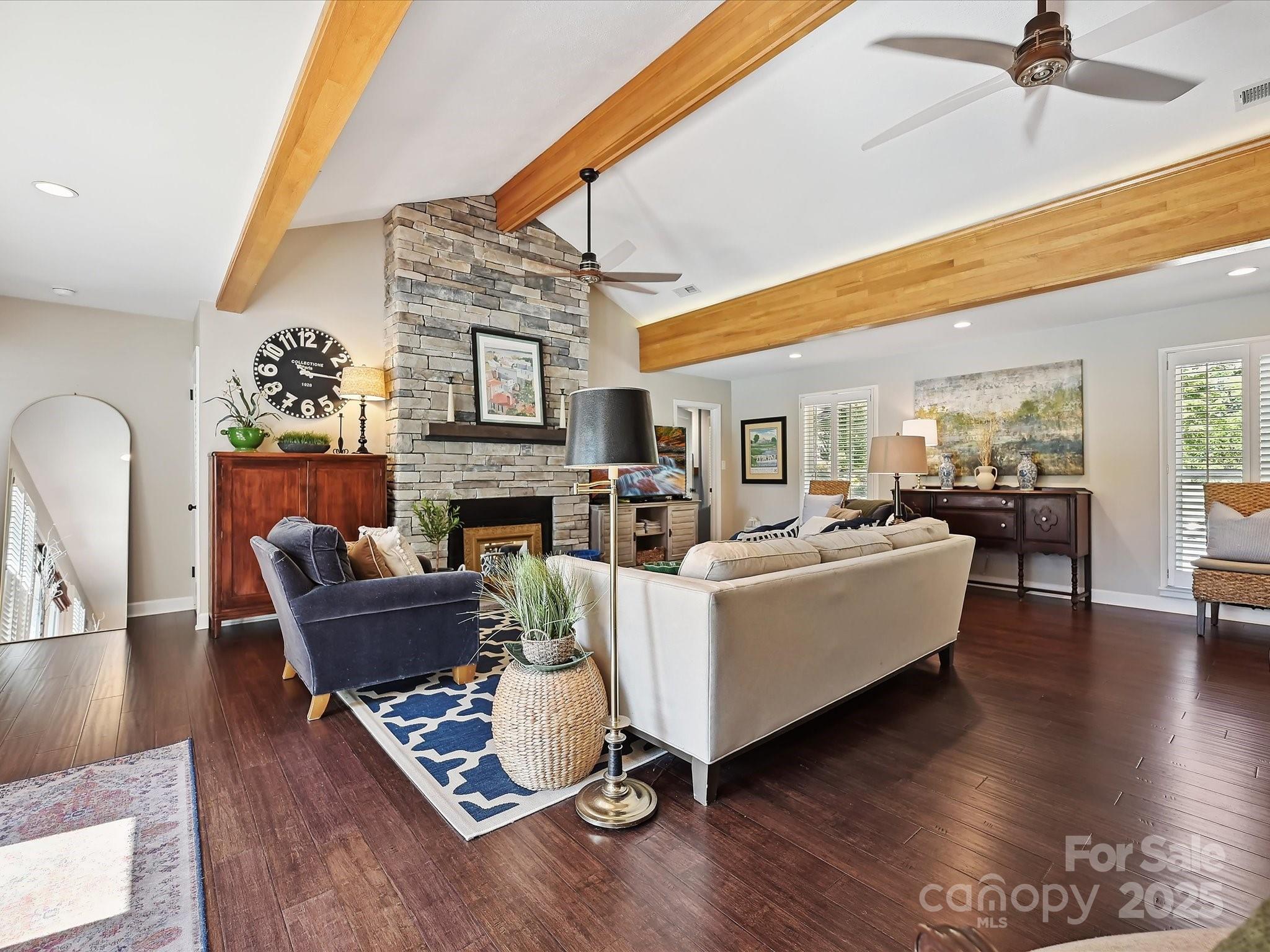 169 Spring Run Road Mooresville, NC 28117 - Photo 10 of 41 a living room with furniture fireplace and wooden floor