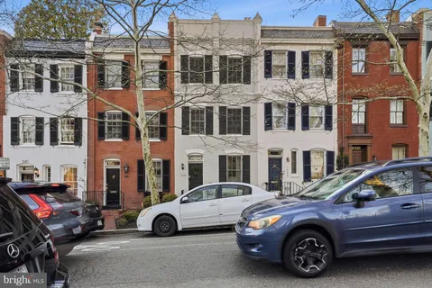 a car parked in front of a building