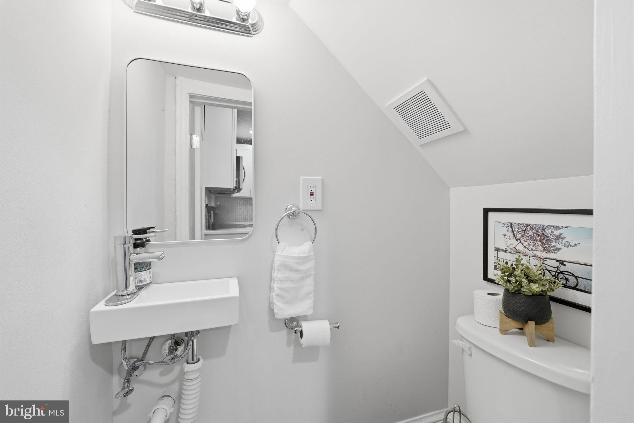 1544 34th Street Northwest Washington, DC 20007 - Photo 9 of 26 Convenient first floor half-bath