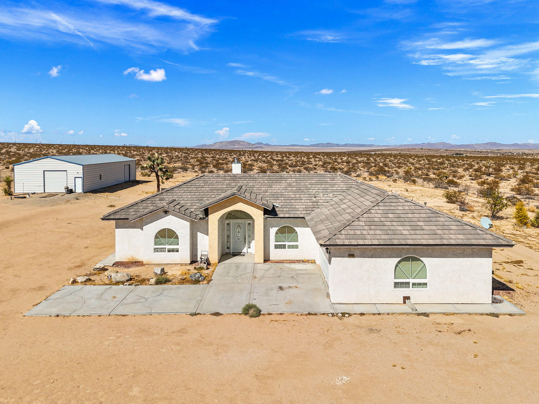 62734 Starlight Street Joshua Tree, CA 92252 - Photo 2 of 60 a view of roof with city view