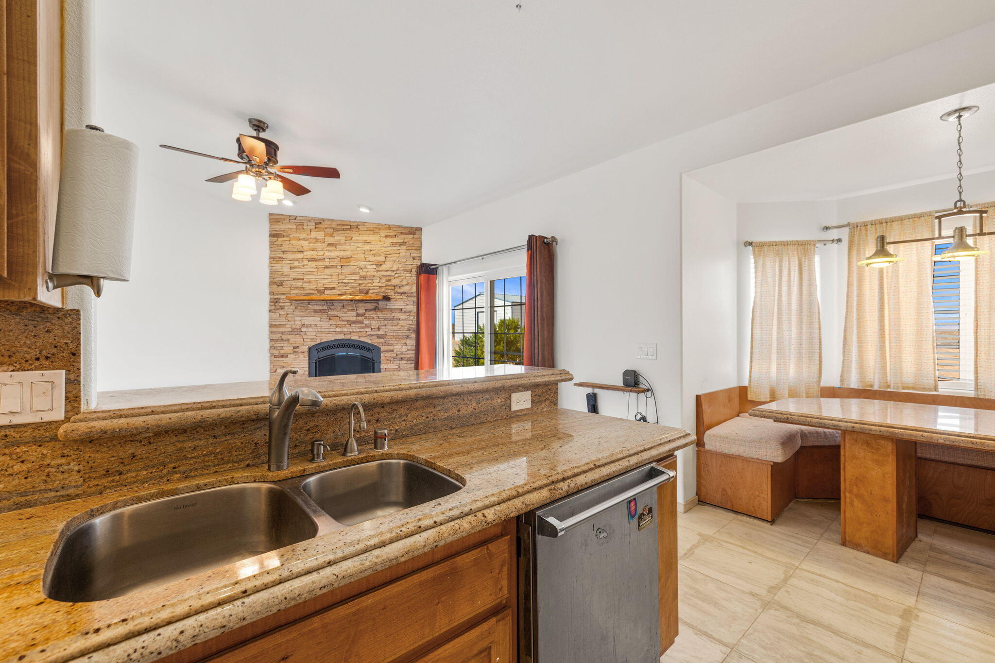 62734 Starlight Street Joshua Tree, CA 92252 - Photo 21 of 60 a kitchen with a sink and a window