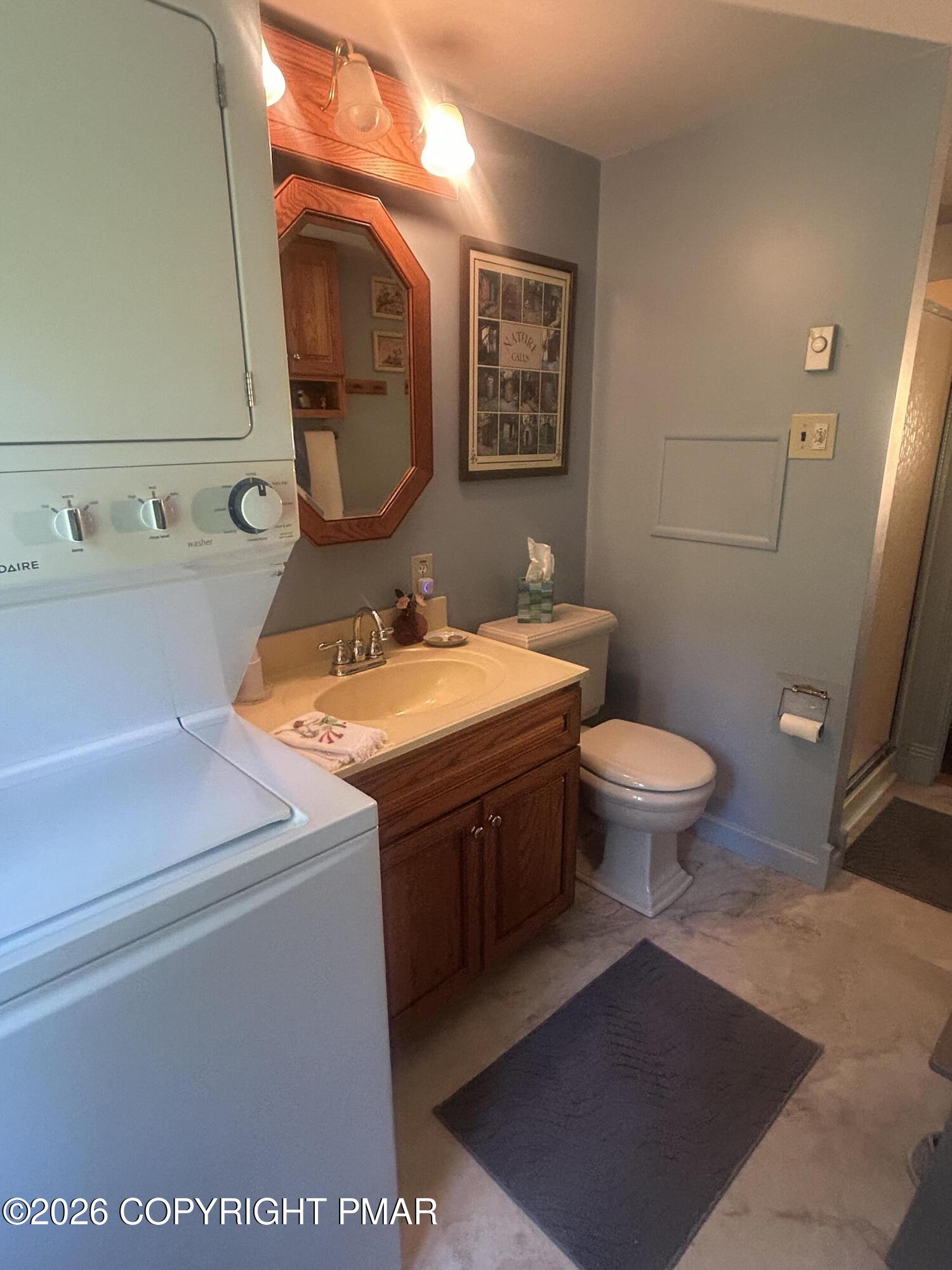 4379 River Road Mount Bethel, PA 18343 - Photo 31 of 48 a bathroom with a sink toilet and mirror