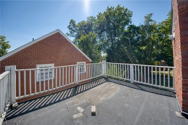a view of a wooden fence