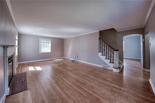 a view of entryway with wooden floor