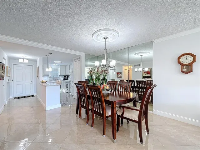 a view of a dining room and livingroom