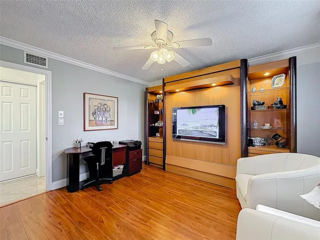 a view of a livingroom with furniture and window