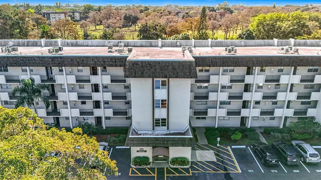a terrace with outdoor seating and city view