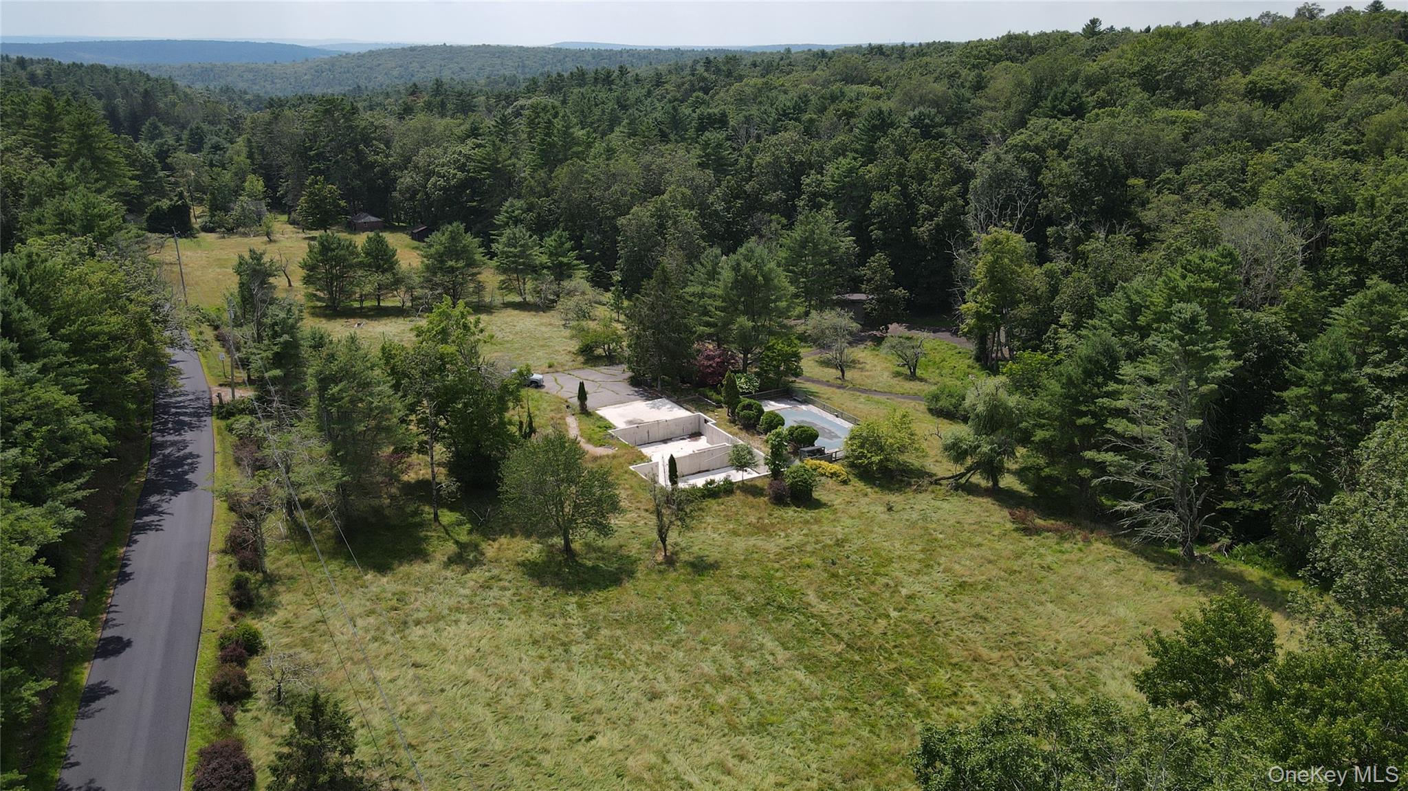 259 Lackawaxen Road Narrowsburg, NY 12764 - Photo 2 of 34 a view of a bench in a garden