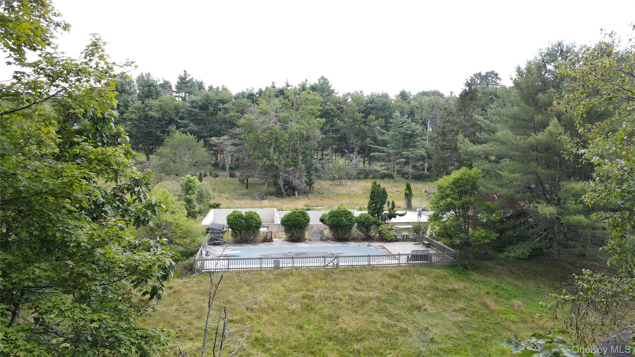 259 Lackawaxen Road Narrowsburg, NY 12764 - Photo 5 of 34 a view of a table and chairs in the garden