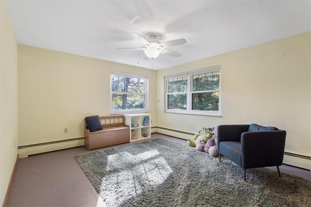 393 Brewer Road Rochester, PA 15074 - Photo 14 of 25 a living room with furniture and a window
