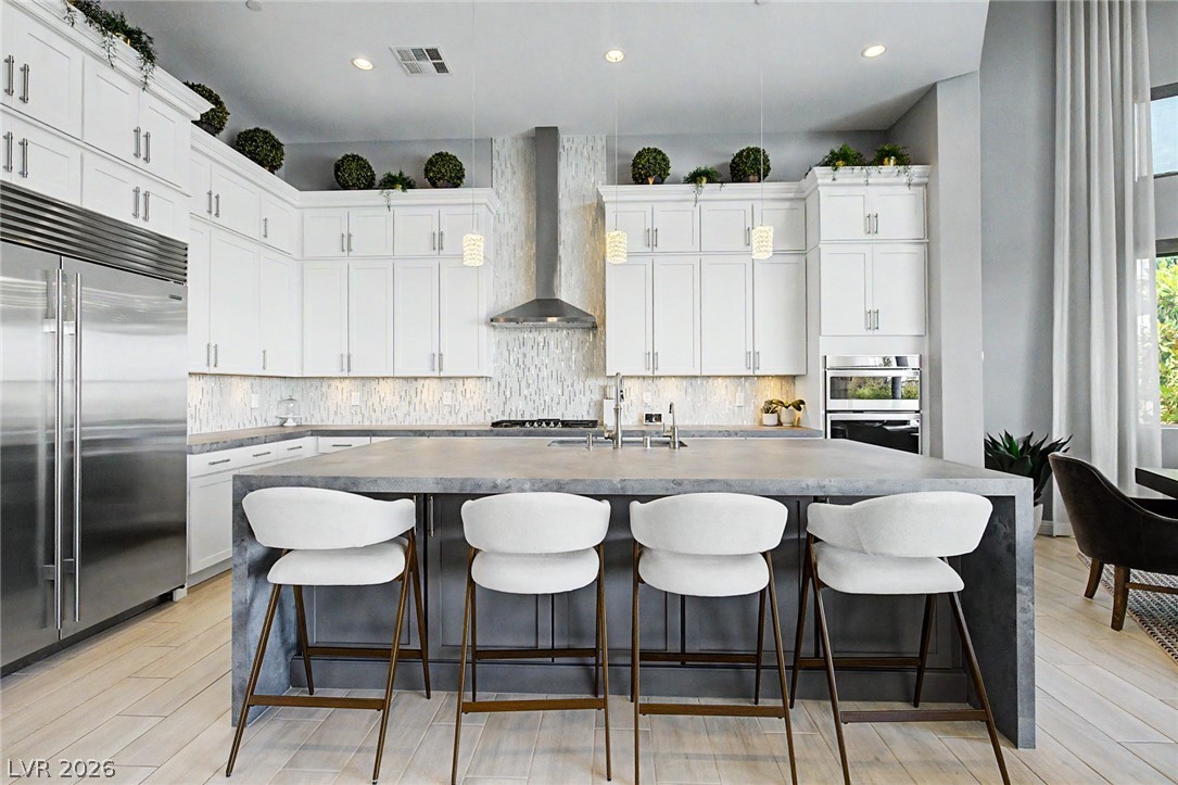 6014 Willow Ridge Court Las Vegas, NV 89135 - Photo 29 of 99 This kitchen features a large island and ample counter space for all your culinary endeavors.