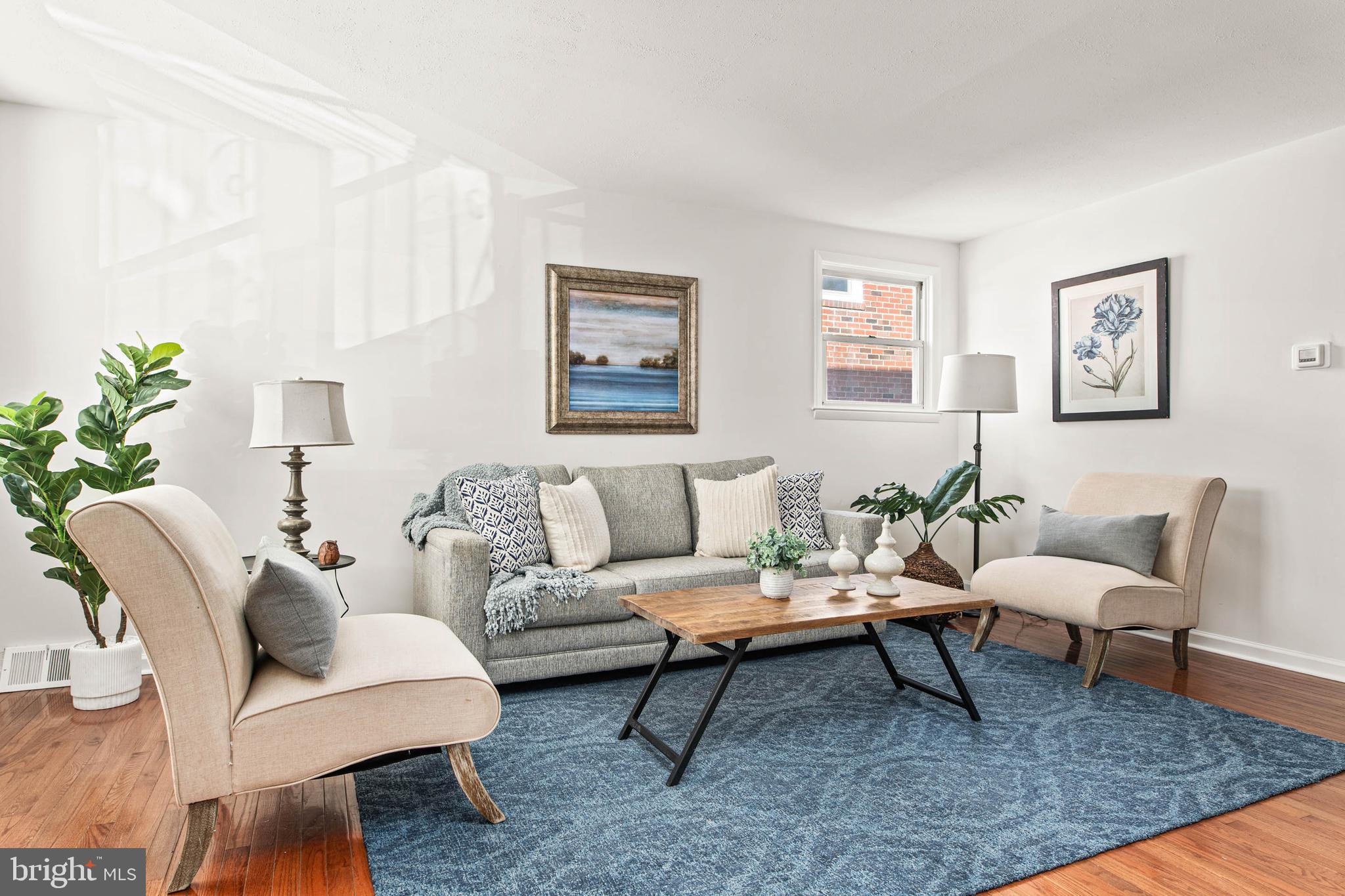 318 Ripka Street Philadelphia, PA 19128 - Photo 4 of 24 a living room with furniture and wooden floor