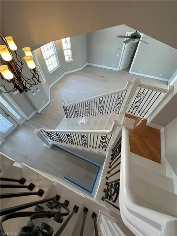 a view of a hallway with bathroom