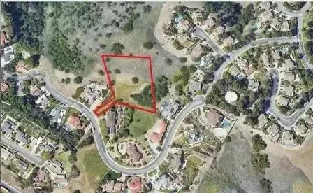 an aerial view of a highlighted house