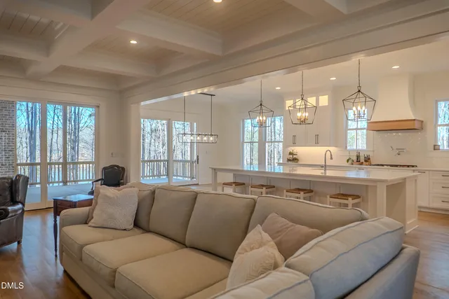 a kitchen with a refrigerator and a sink