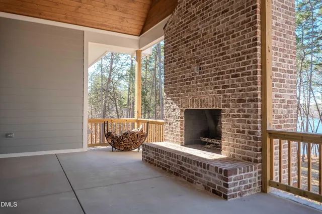 a white bath tub sitting in a bathroom next to a window