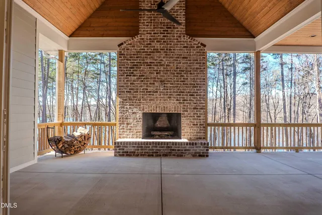 a spacious bathroom with a double vanity sink a mirror and a bathtub