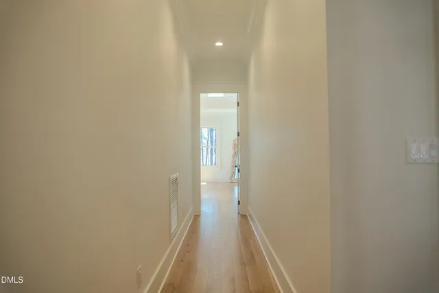 a view of a room that has a window in it