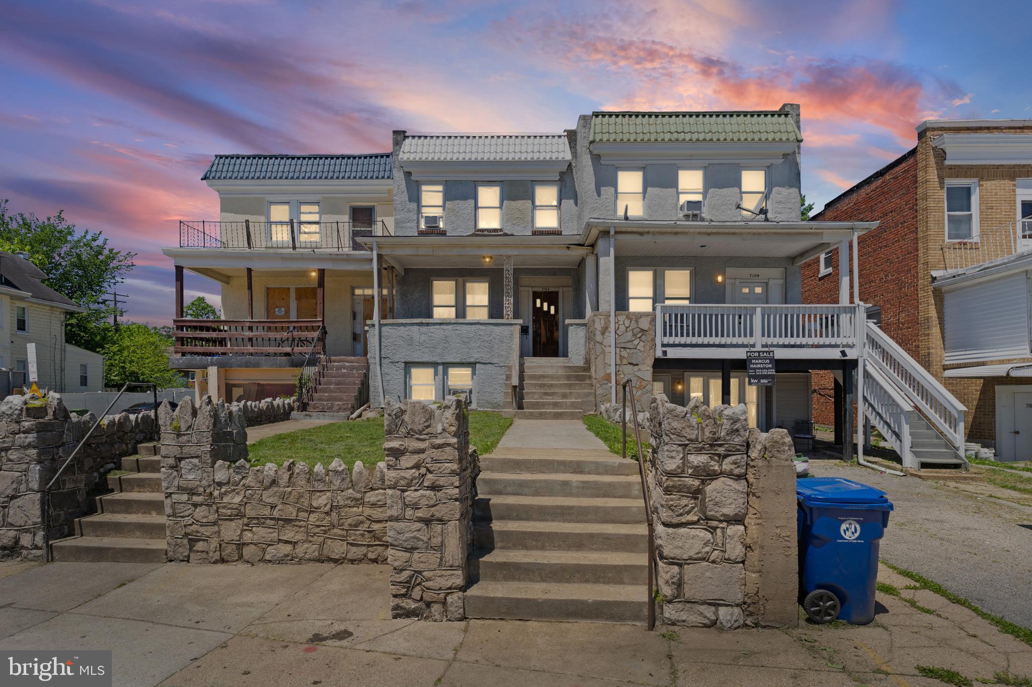 7102 Harford Road Baltimore, MD 21234 - Photo 2 of 2 a front view of a house with a garden