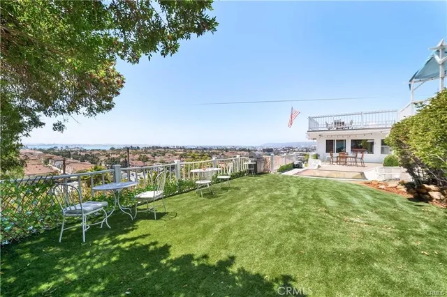 a view of a chairs and table on the terrace