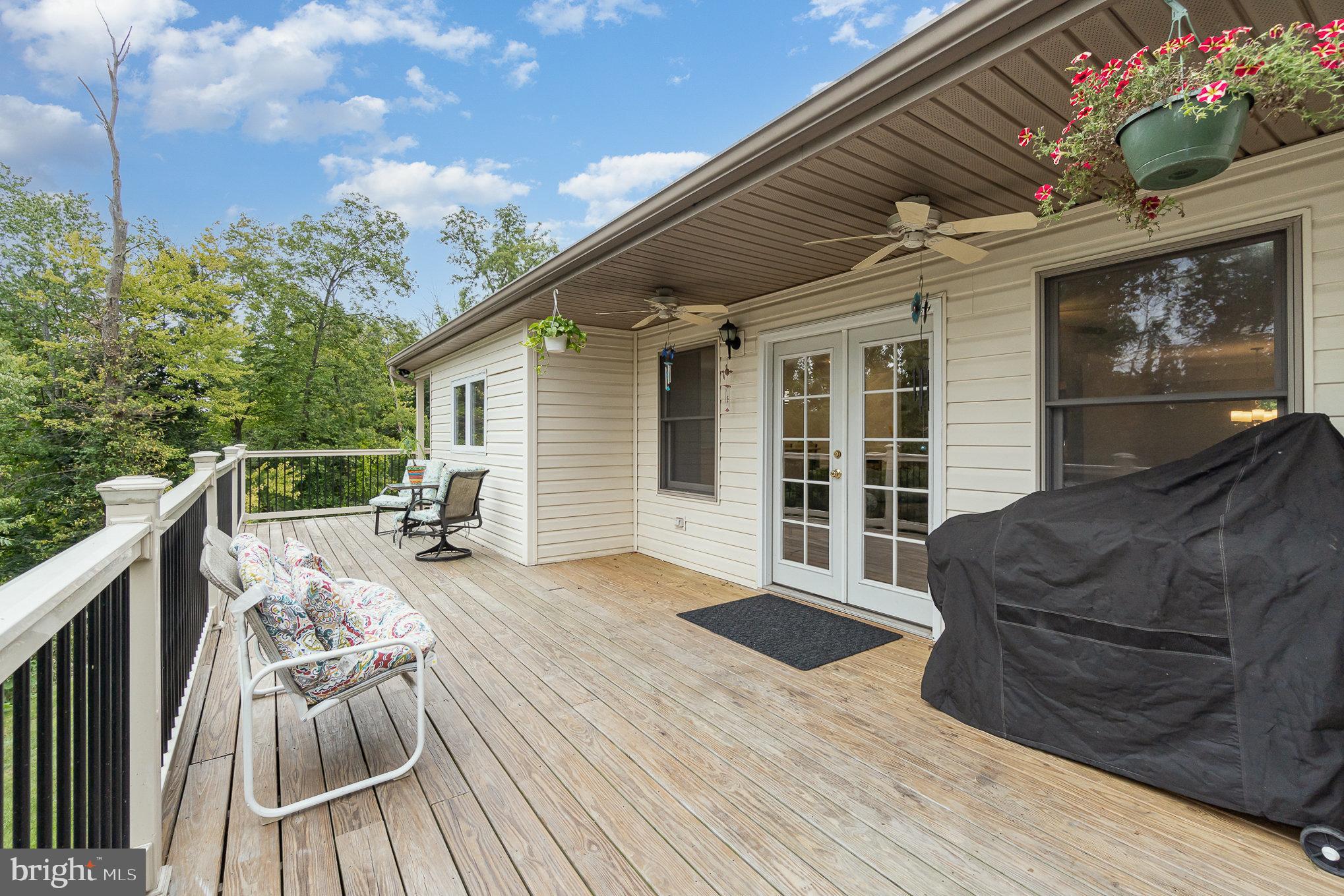 6756 Jonestown Road Harrisburg, PA 17112 - Photo 30 of 38 Generous sized deck off main floor with some cover