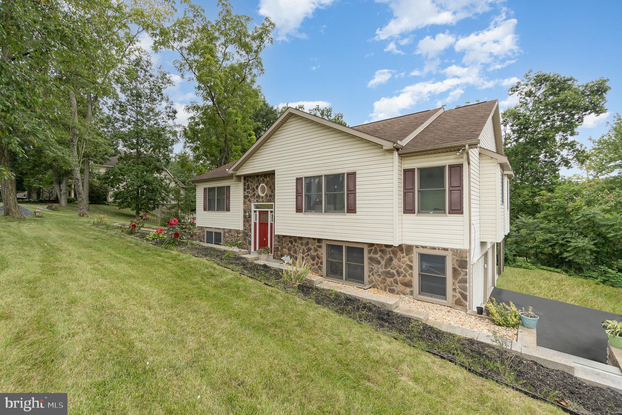 6756 Jonestown Road Harrisburg, PA 17112 - Photo 3 of 38 Sits back from the road impressive hard-scaping