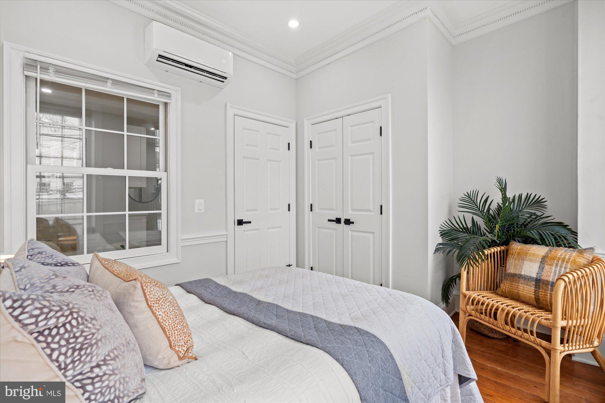 524 Queen Street Alexandria, VA 22314 - Photo 14 of 64 a bedroom with a bed and a window