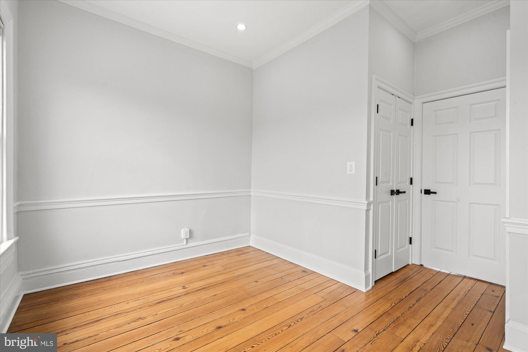 524 Queen Street Alexandria, VA 22314 - Photo 31 of 64 a view of a room with wooden floor