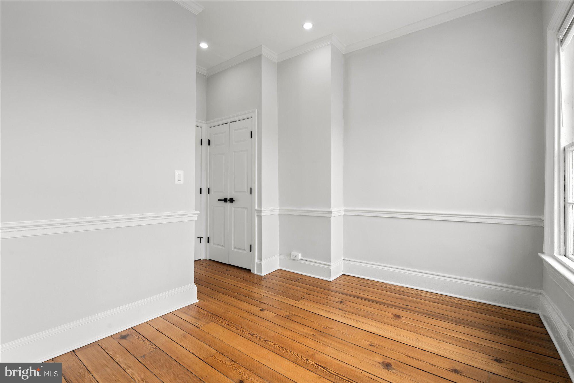 524 Queen Street Alexandria, VA 22314 - Photo 32 of 64 a view of empty room with wooden floor