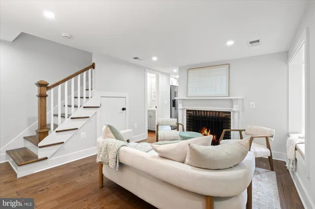 a living room with furniture and window