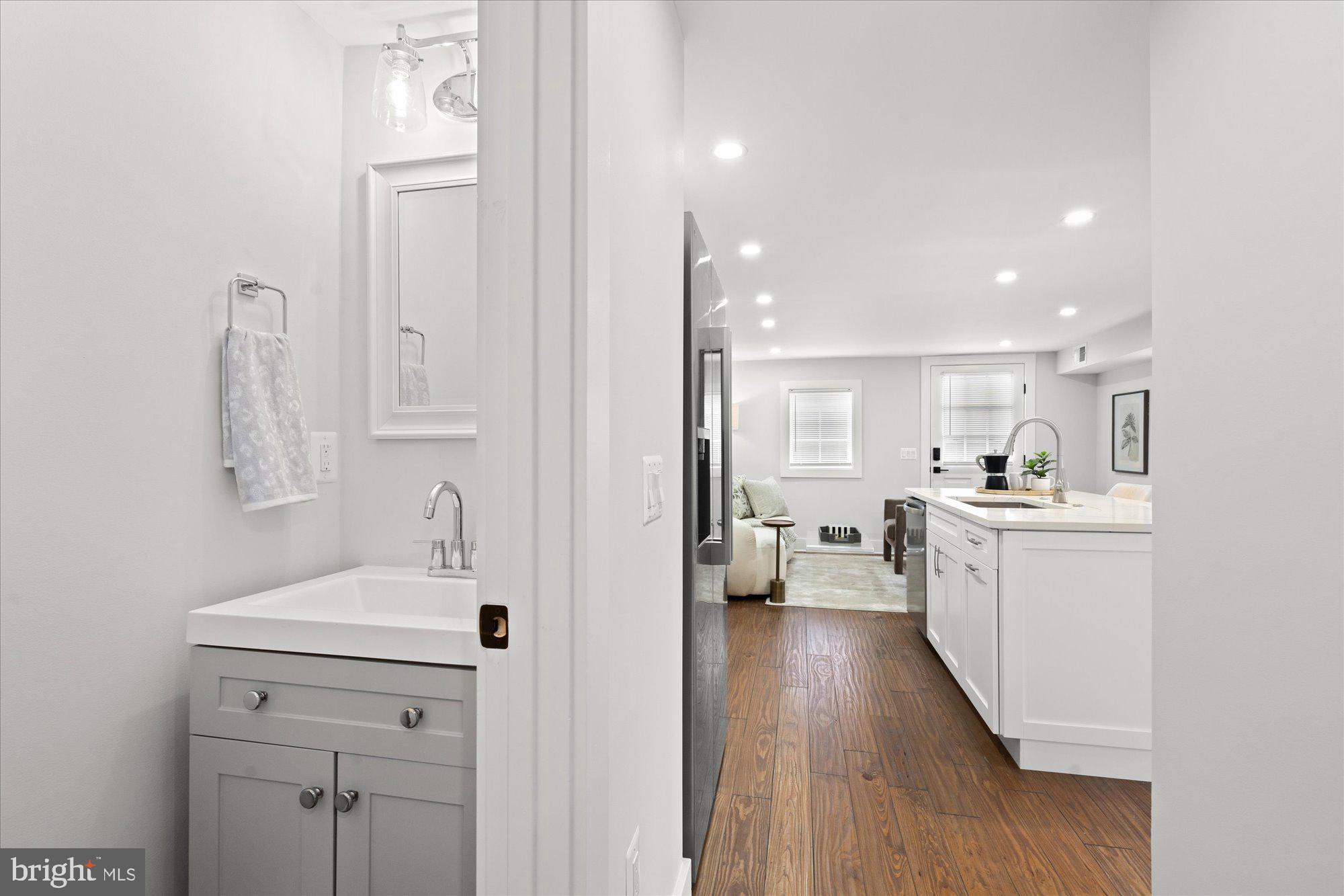 524 Queen Street Alexandria, VA 22314 - Photo 40 of 64 a view of living room with furniture and wooden floor