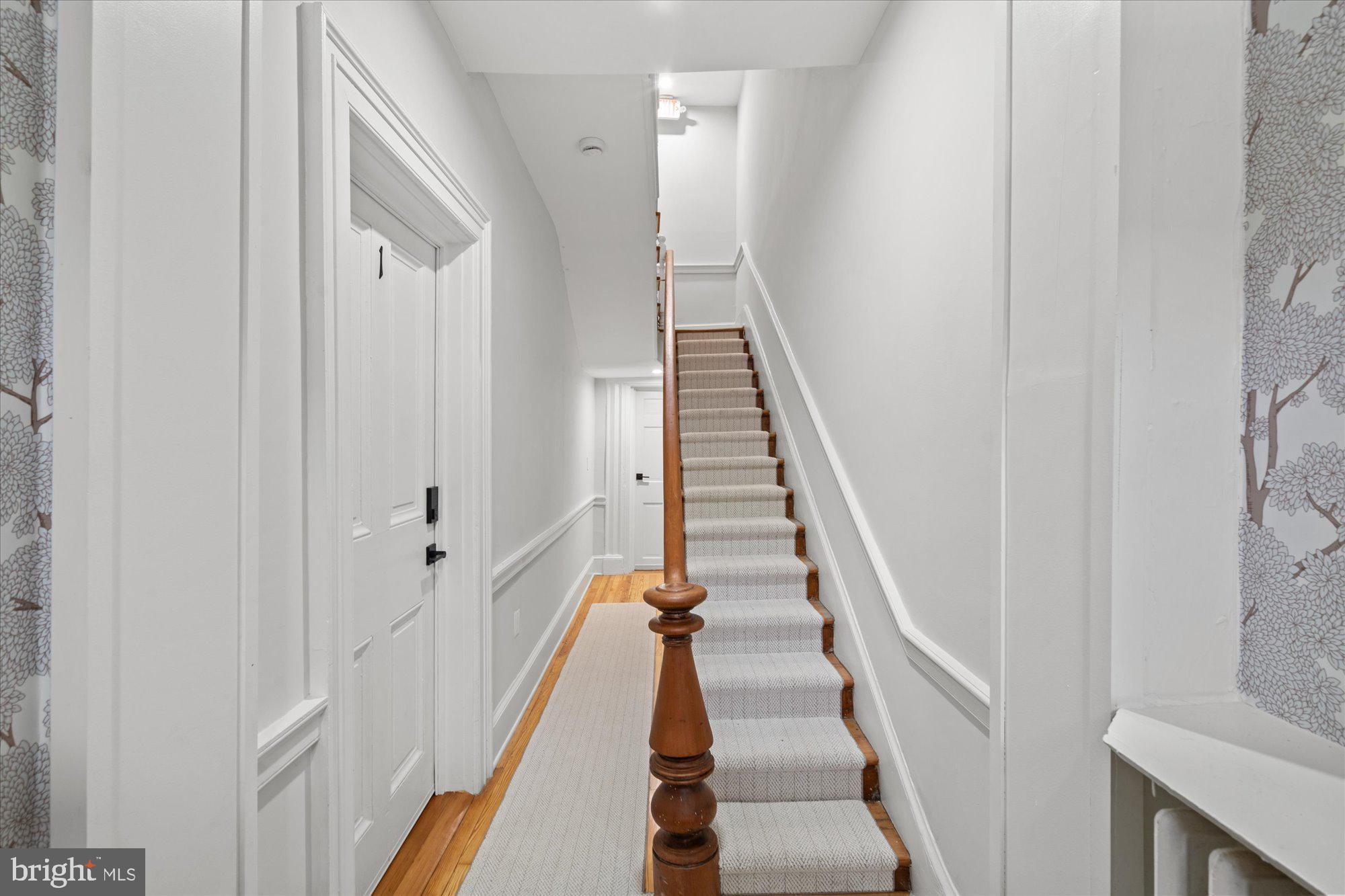 524 Queen Street Alexandria, VA 22314 - Photo 5 of 64 a view of entryway and hall with wooden floor