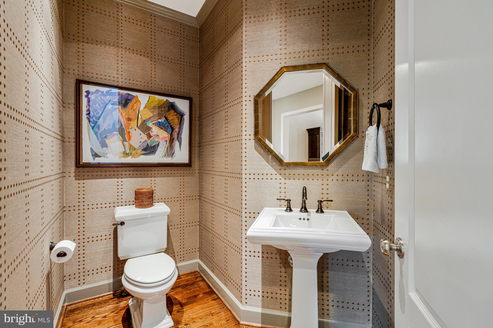 1029 Founders Ridge Lane McLean, VA 22102 - Photo 15 of 71 a bathroom with a toilet sink and mirror