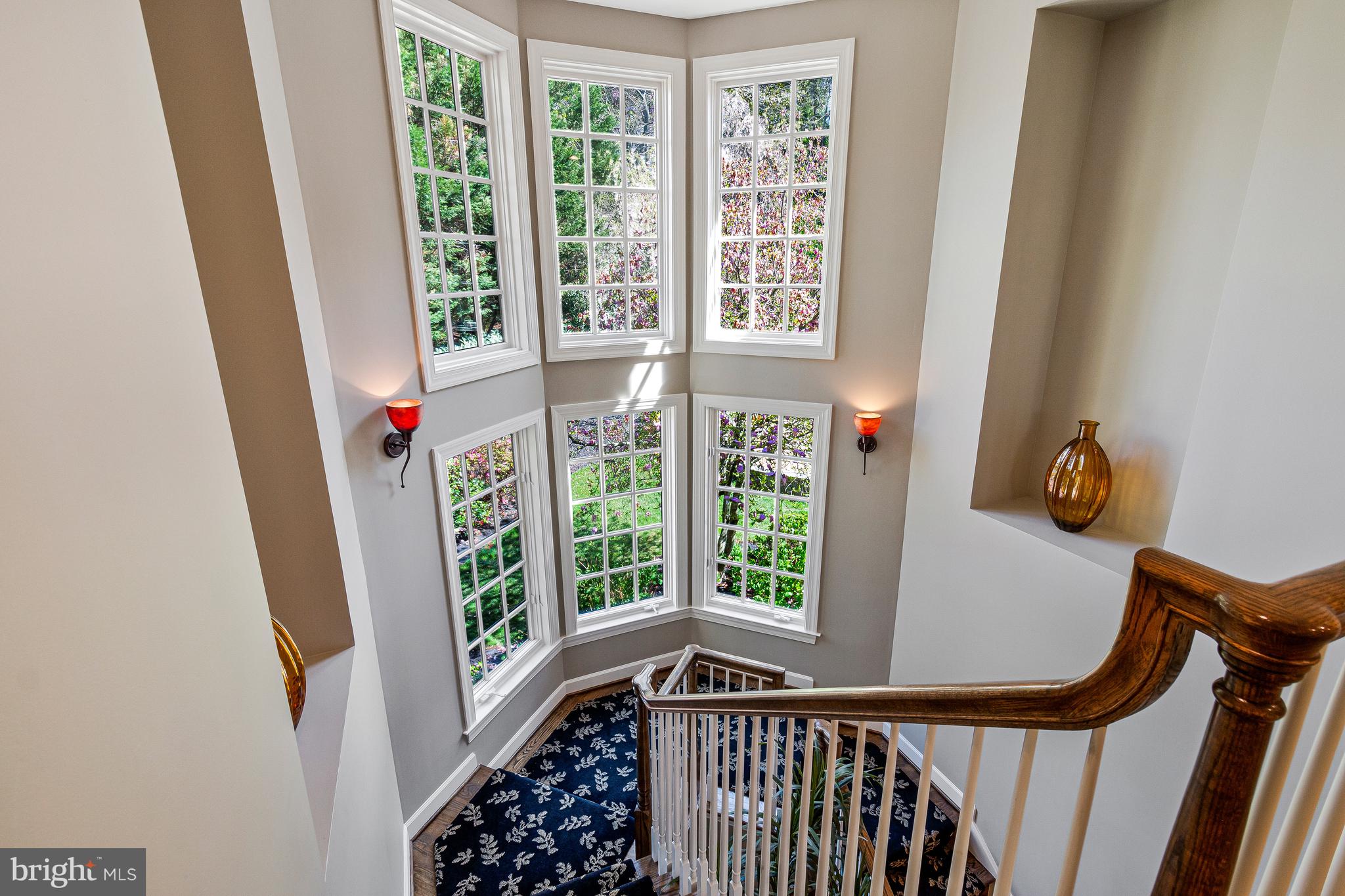 1029 Founders Ridge Lane McLean, VA 22102 - Photo 17 of 71 a view of a hallway with wooden floor and a window