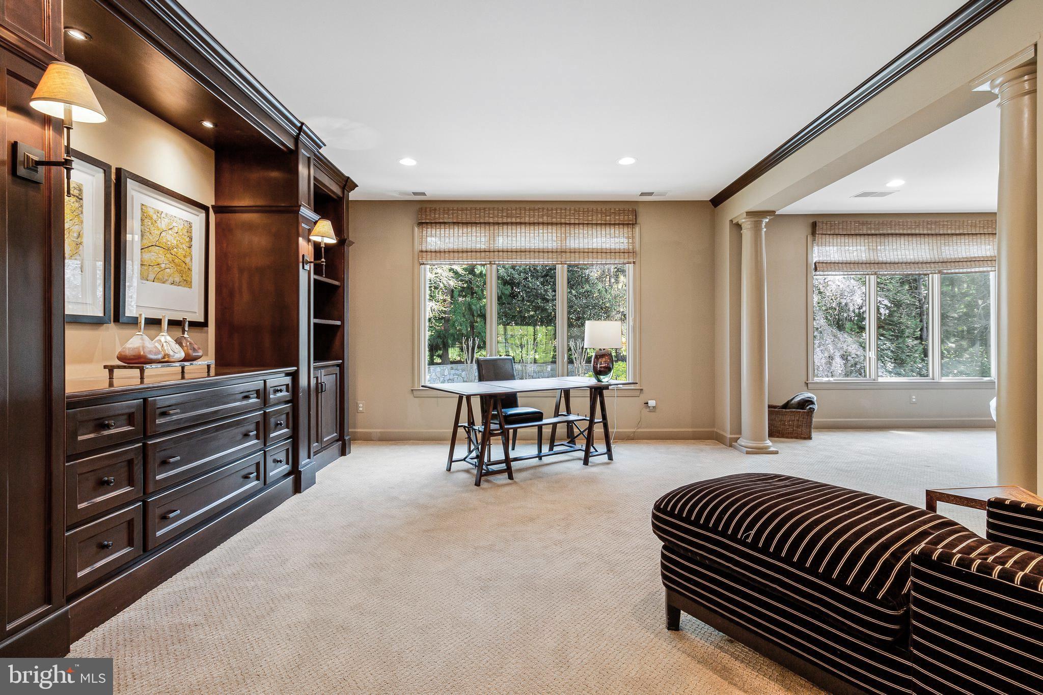 1029 Founders Ridge Lane McLean, VA 22102 - Photo 29 of 71 a living room with furniture a window and a chandelier