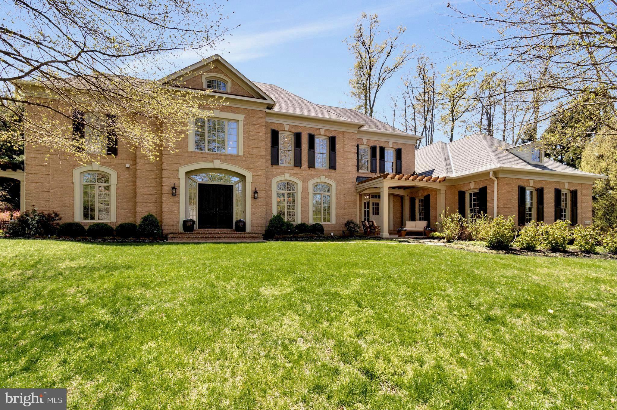 1029 Founders Ridge Lane McLean, VA 22102 - Photo 4 of 71 a front view of a house with a garden