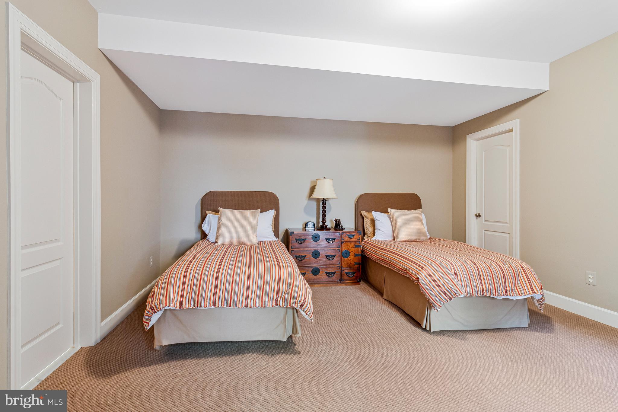 1029 Founders Ridge Lane McLean, VA 22102 - Photo 51 of 71 a bedroom with two beds and a window