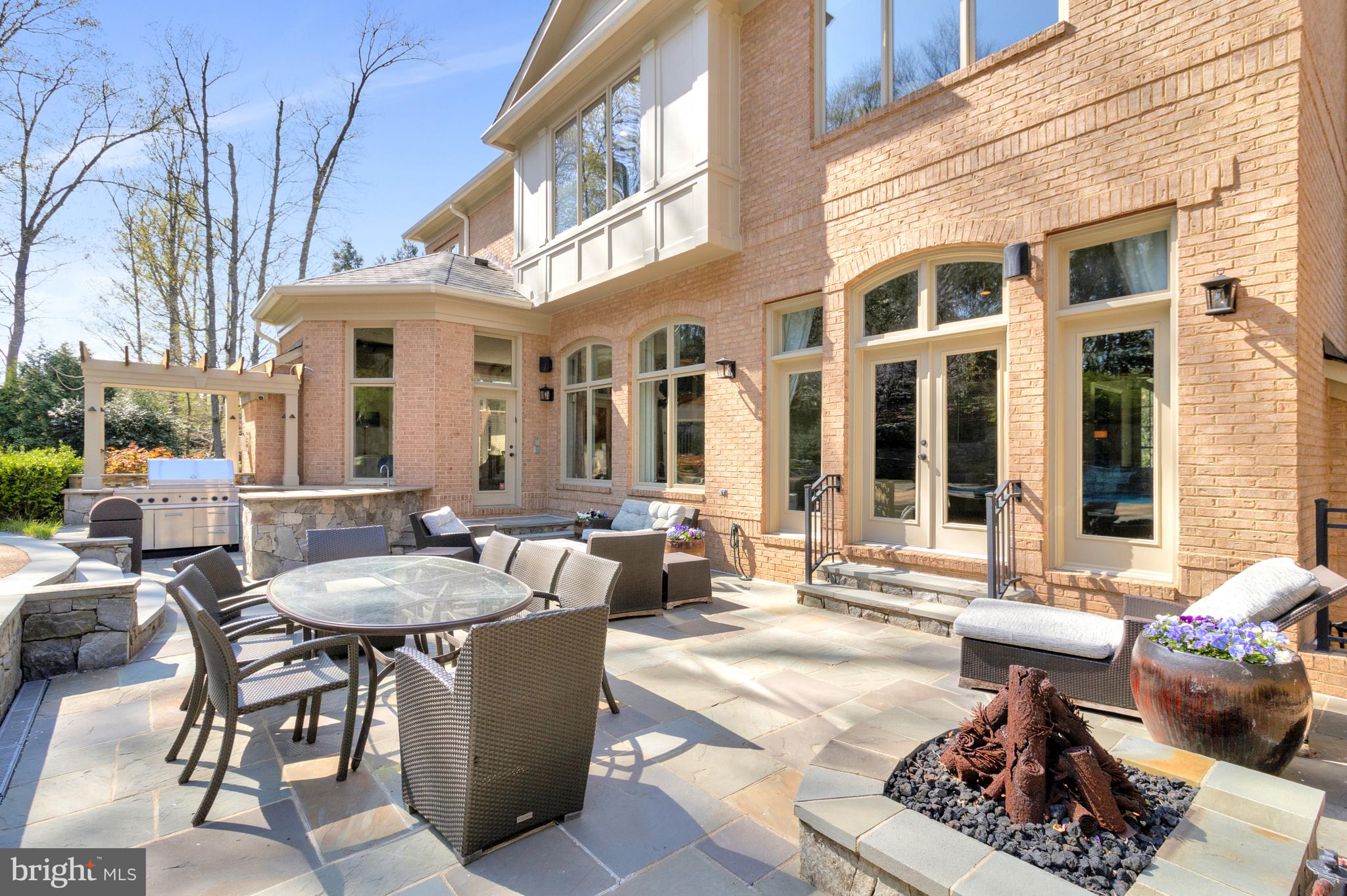 1029 Founders Ridge Lane McLean, VA 22102 - Photo 54 of 71 a view of a patio with couches table and chairs and potted plants