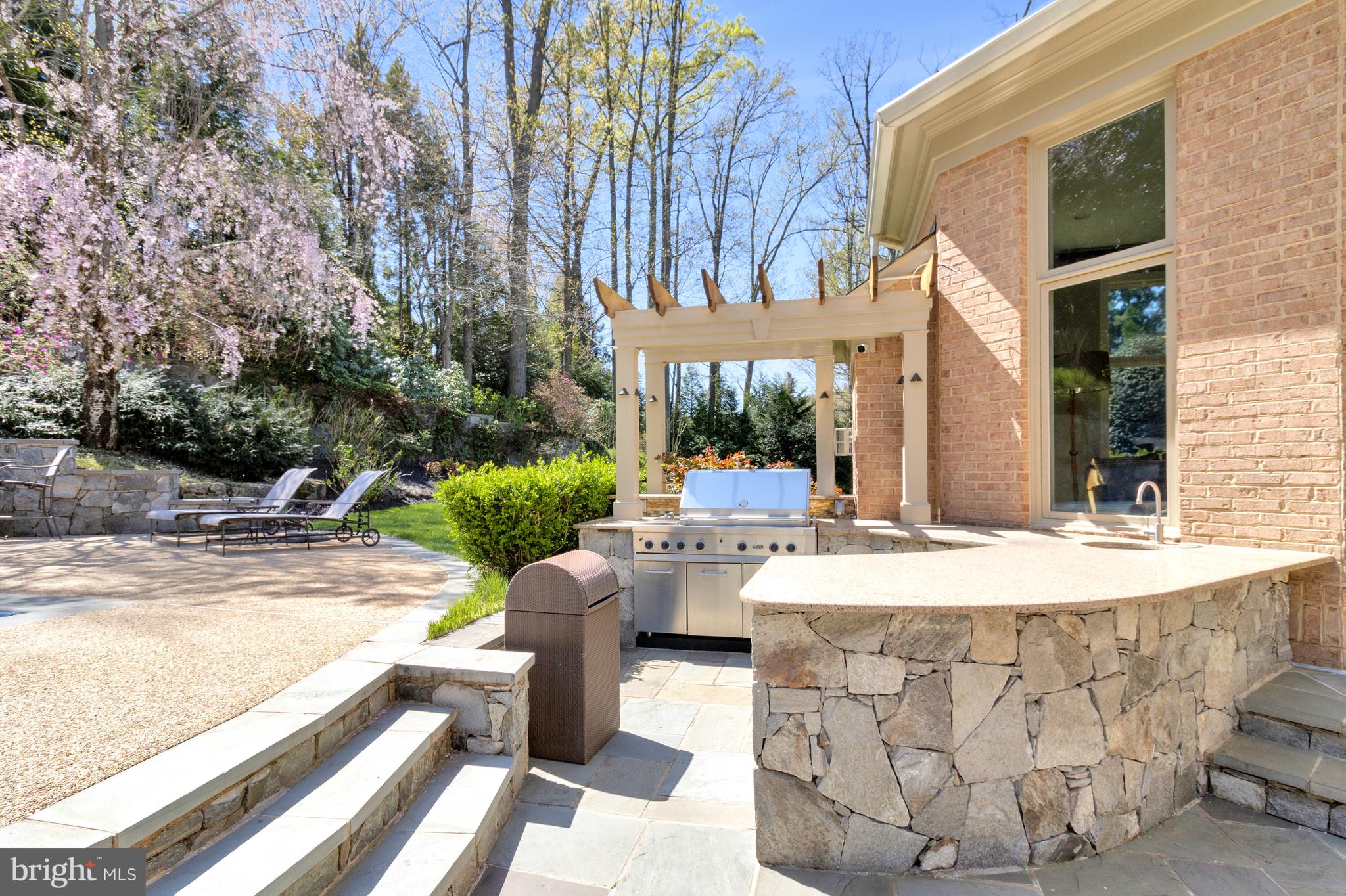 1029 Founders Ridge Lane McLean, VA 22102 - Photo 61 of 71 a view of a patio with couches table and chairs and potted plants