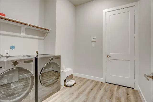 a view of a garden with an outdoor seating