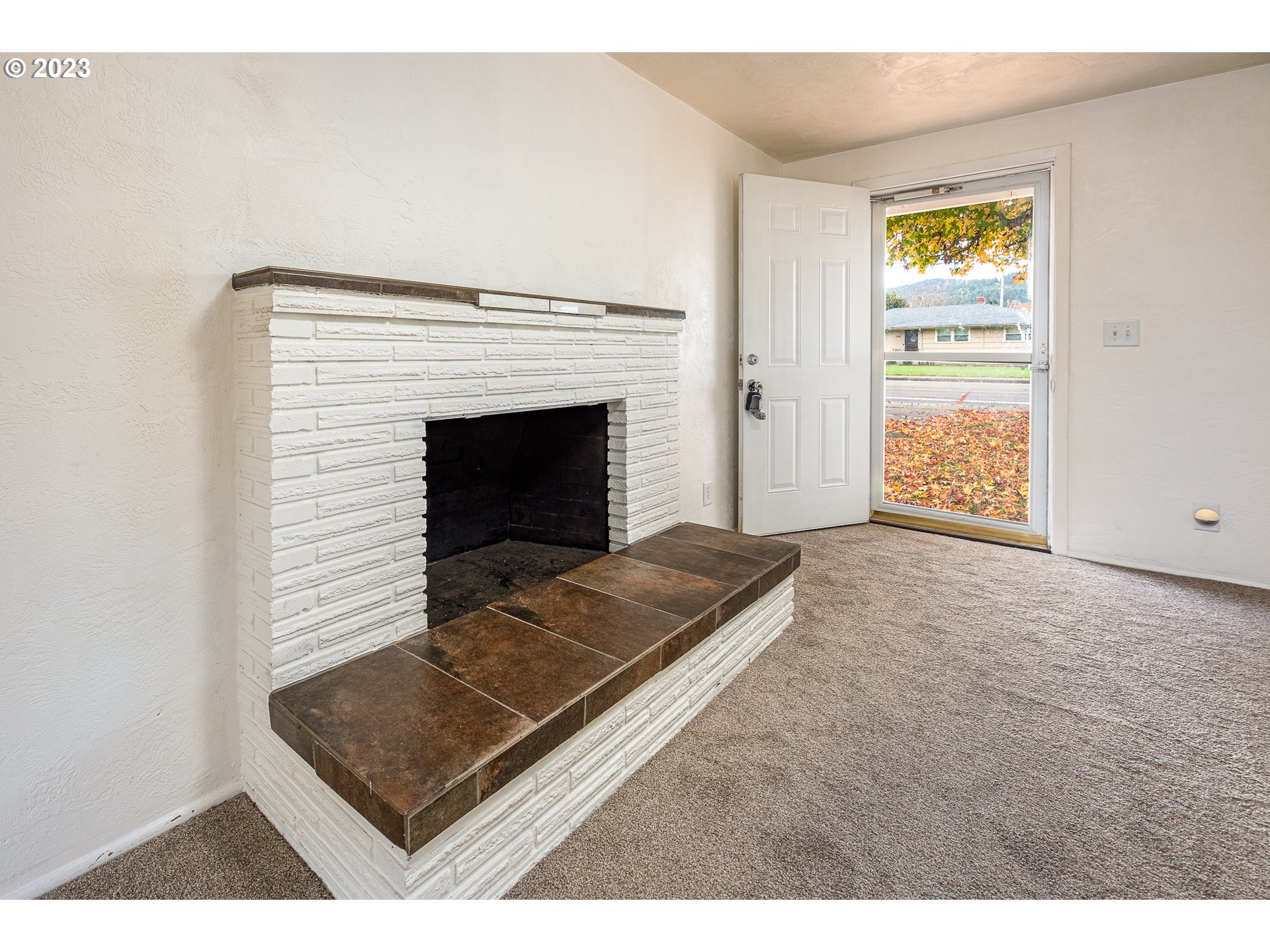 3944 Jasper Road Springfield, OR 97478 - Photo 3 of 25 a living room with furniture and a fireplace