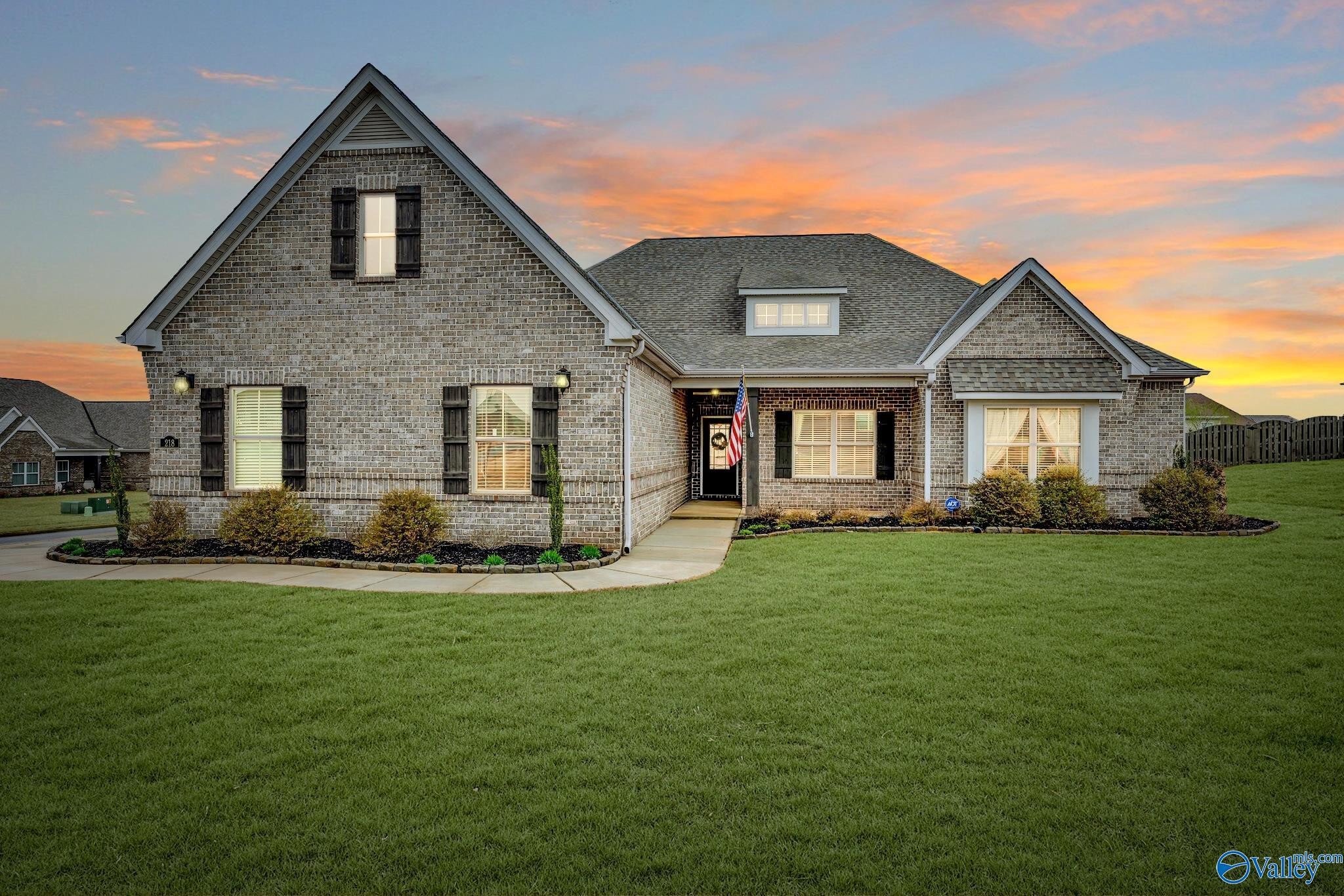 218 Southwest Winterbranch Road Madison, AL 35756 - Photo 1 of 47 a front view of a house with a yard
