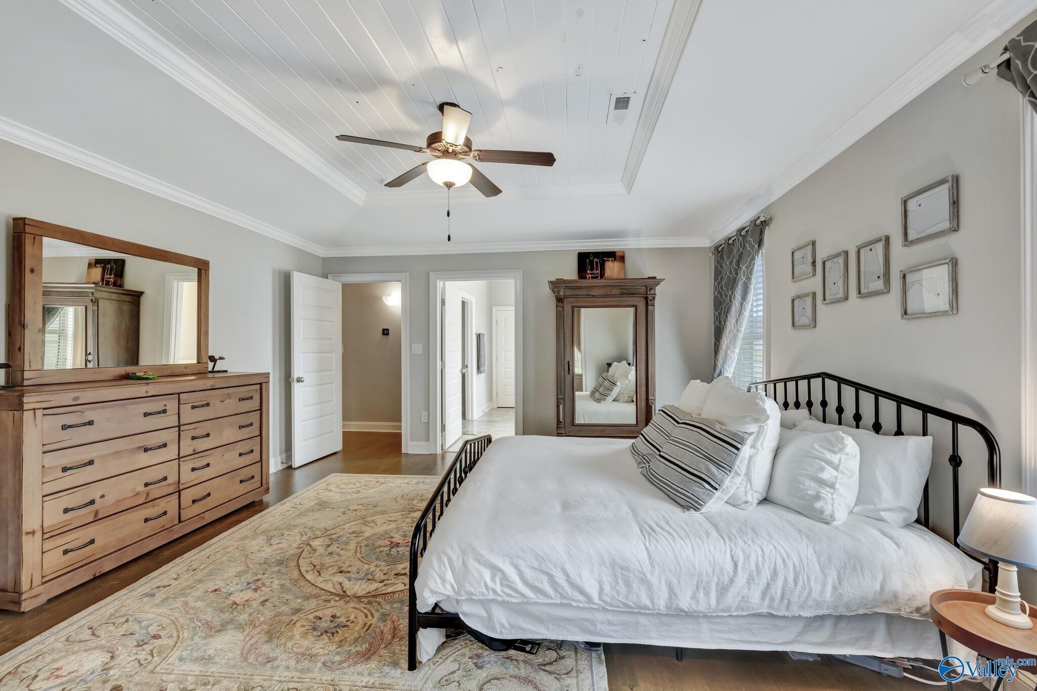 218 Southwest Winterbranch Road Madison, AL 35756 - Photo 19 of 47 a bedroom with a large bed and furniture