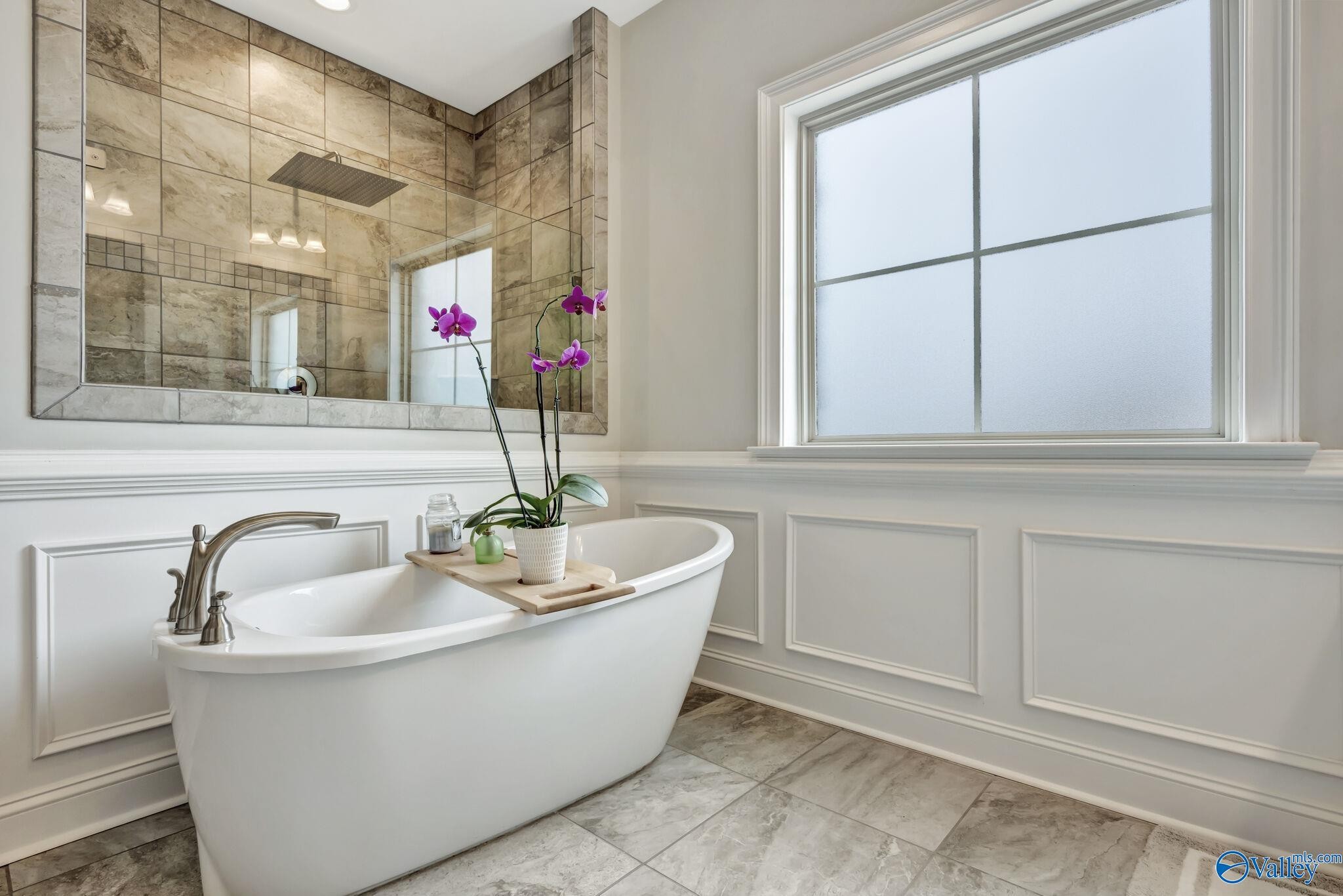 218 Southwest Winterbranch Road Madison, AL 35756 - Photo 26 of 47 a bathroom with a bathtub and a sink