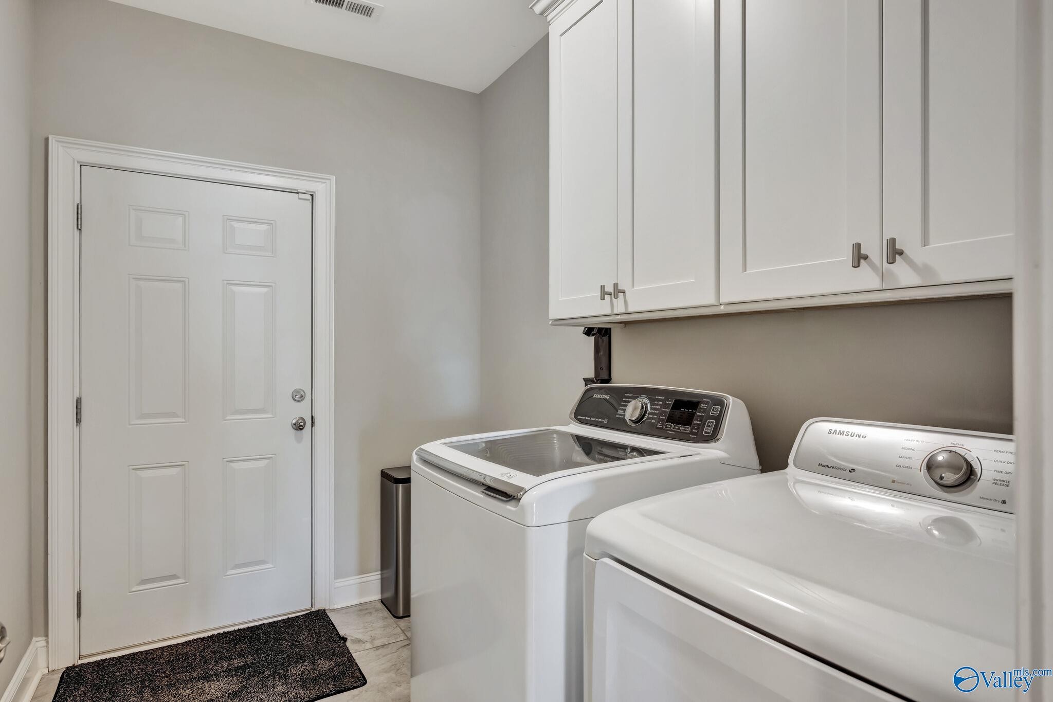 218 Southwest Winterbranch Road Madison, AL 35756 - Photo 27 of 47 a utility room with dryer and washer