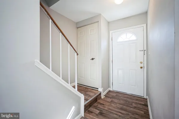 a view of a hallway with staircase