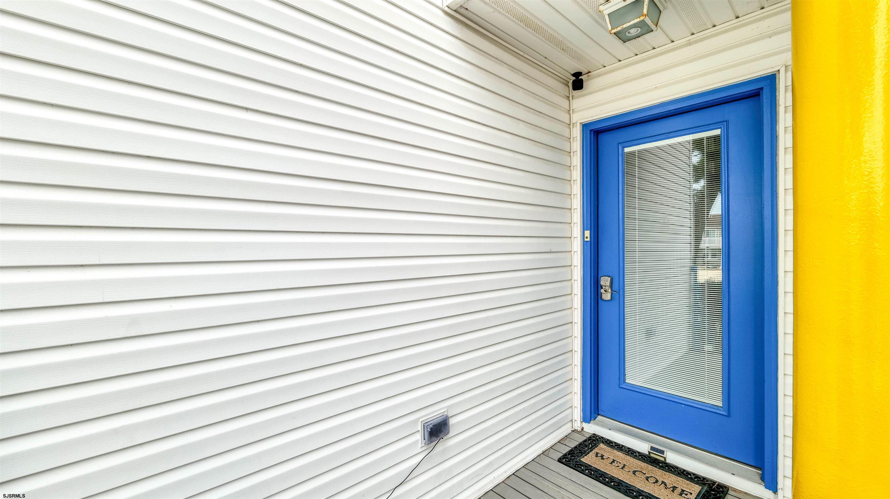 525 Lagoon Boulevard Brigantine, NJ 08203 - Photo 13 of 52 a view of a hallway with wooden floor