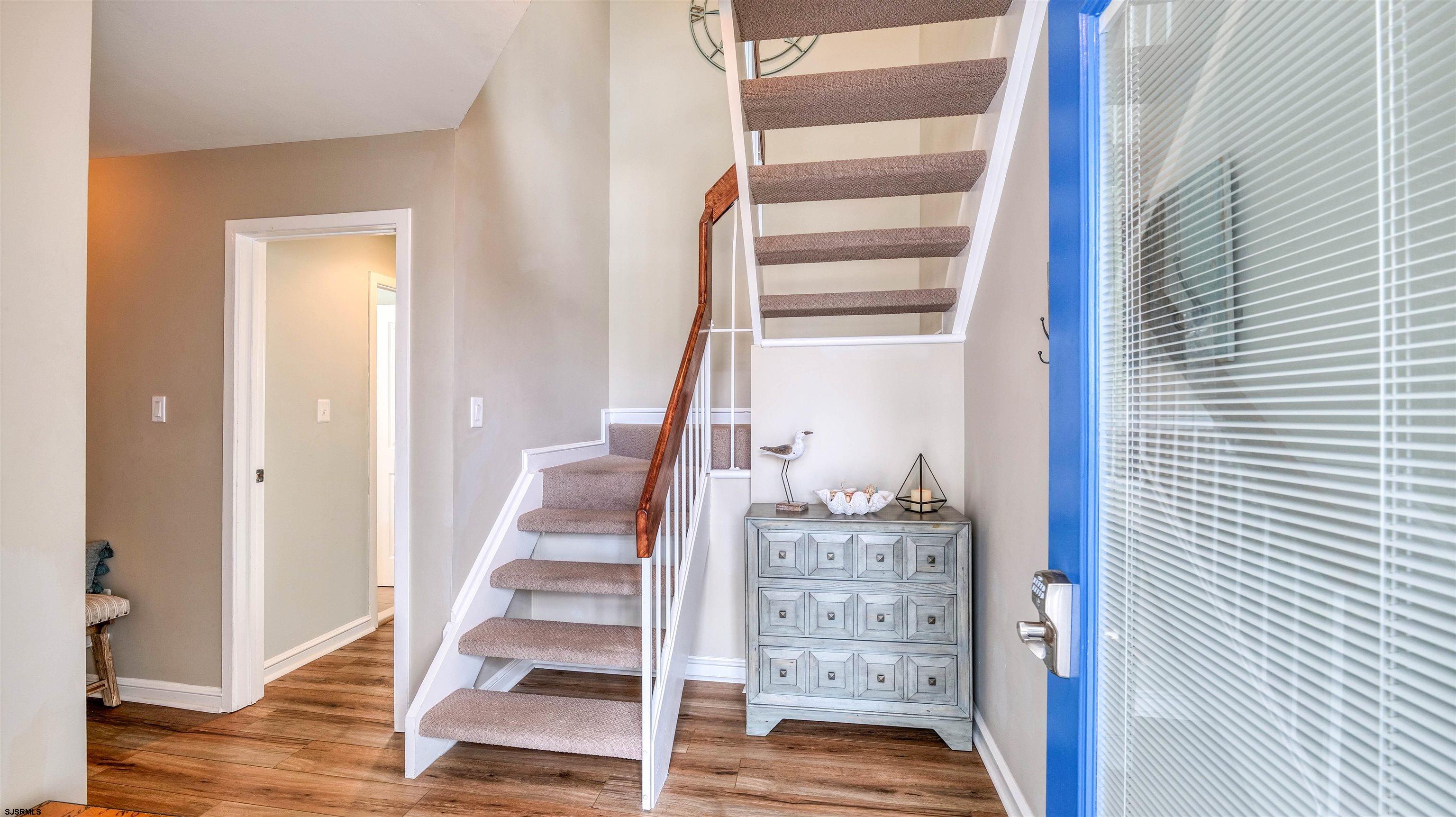 525 Lagoon Boulevard Brigantine, NJ 08203 - Photo 14 of 52 a view of front door with wooden floor and windows