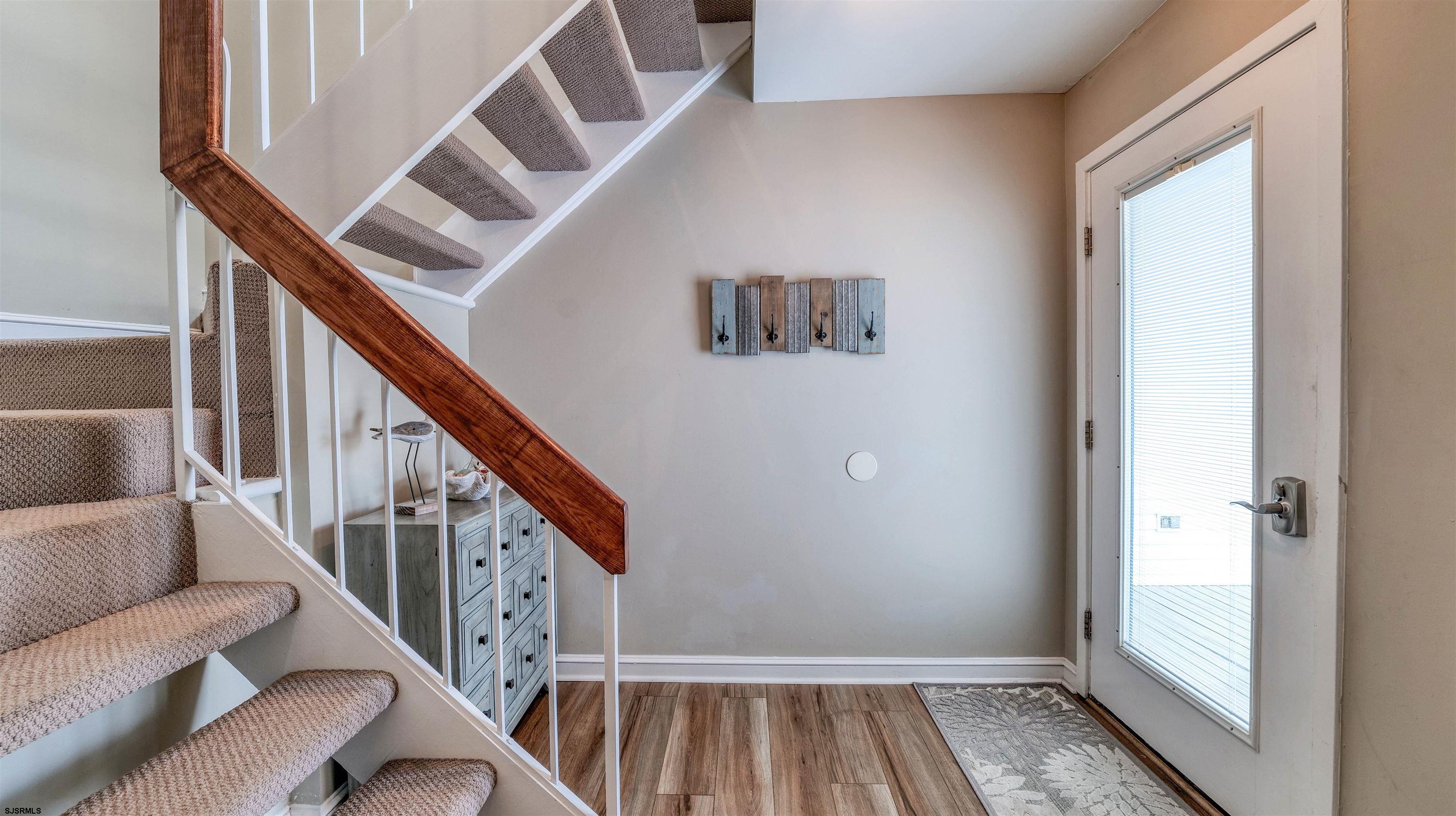 525 Lagoon Boulevard Brigantine, NJ 08203 - Photo 15 of 52 a view of entryway with wooden floor and stairs
