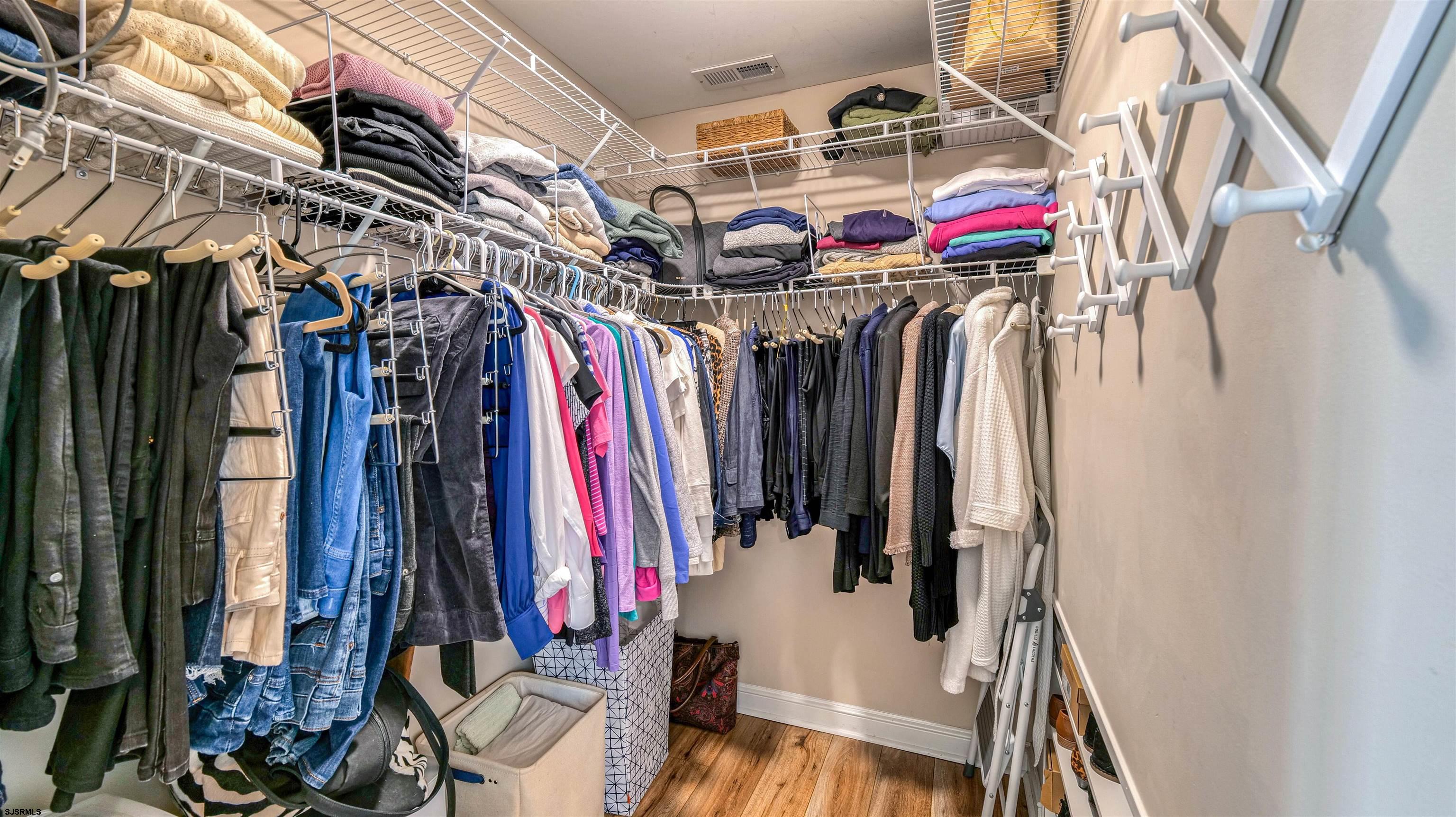 525 Lagoon Boulevard Brigantine, NJ 08203 - Photo 22 of 52 a view of walk in closet with clothes